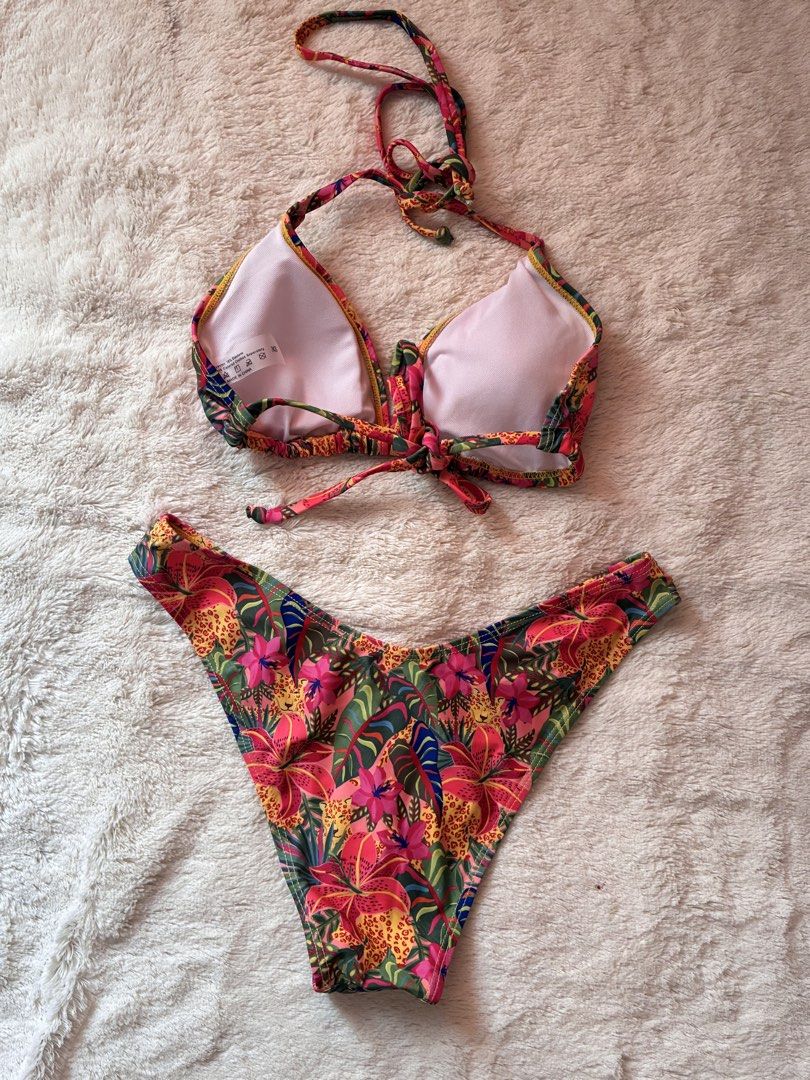 SHEIN Bikini Tropical Floral Print Multicolor (Category: Bikinis & Swimsuits) located in Quezon City. Submitted by jenlo_declutter (Listing ID 1436901177, Image 2). Description: SHEIN Bikini Tropical Print Multicolor Size: XS Other details Looks better in personal Perfect fit Top is adjustable (Tied bikini) Perfect for summer wear Once used only for beach trip No damage (I only removed the bottom’s hygiene sticker after using it) Removed the tag 