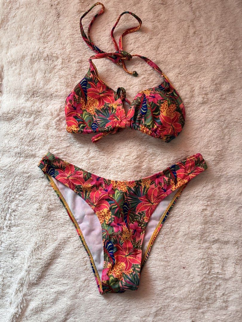 SHEIN Bikini Tropical Floral Print Multicolor (Category: Bikinis & Swimsuits) located in Quezon City. Submitted by jenlo_declutter (Listing ID 1436901177, Image 1). Description: SHEIN Bikini Tropical Print Multicolor Size: XS Other details Looks better in personal Perfect fit Top is adjustable (Tied bikini) Perfect for summer wear Once used only for beach trip No damage (I only removed the bottom’s hygiene sticker after using it) Removed the tag 