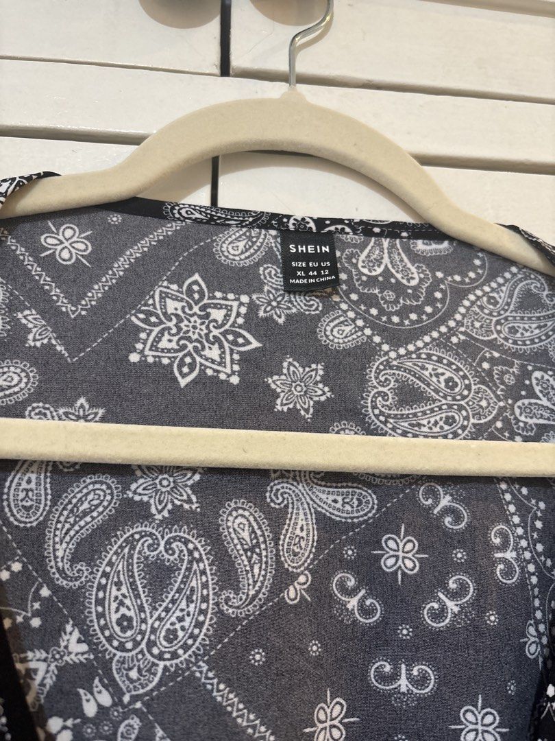 SHEIN Paisley Print Romper - XL (Category: Rompers) located in Las Pinas. Submitted by gelaclosetxx (Listing ID 1436891302, Image 3). Description: - SHEIN romper with a black and white paisley print. - Cutout at the waist. - Size XL on tag - Used twice only, still in good condition.