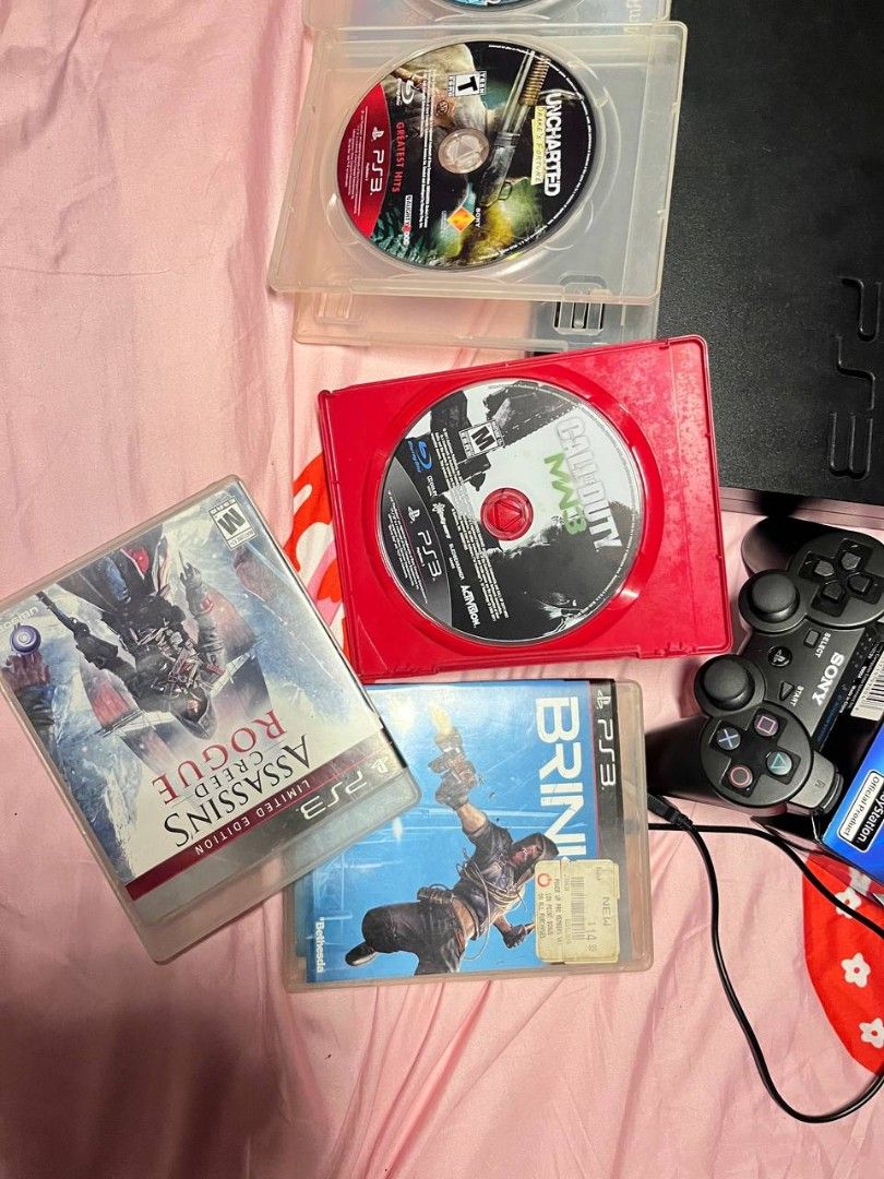 Sony PlayStation 3 Console with Games and Controllers (Category: PlayStation) located in Manila. Submitted by winteo0117 (Listing ID 1436852280, Image 3). Description: PS3 JAILBREAK WITH TONS OF GAMES inclusion: 2 controller(brandnew yung isa) AV powercord 9 cds(all working, mint condi pa) can also play ps1 and ps2!! may mga installed games na (ssx tricky, sengoku basara, metal slug, bully, gta vice city. etc) ps3 games installed (gta v, tekken 6