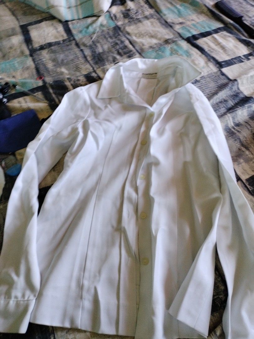 Take all 3 Fashionview White Blouse (Category: Blouses) located in Cavite. Submitted by indigence (Listing ID 1436876598, Image 3). Description: - Fashionview white blouse - Collared neckline - Button-down closure - Long sleeves - Tailored fit - Ideal for formal/office wear - Tag shown in photos.
