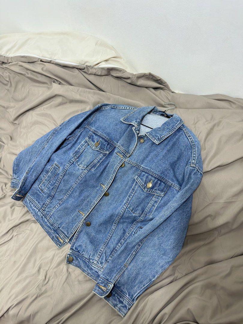 Ton Lion Denim Jacket - Medium (Category: Coats, Jackets and Outerwear) located in Manila. Submitted by hutfris (Listing ID 1436893754, Image 1). Description: - Brand: Ton Lion - Style: Denim Jacket - Features: Button-down front, chest pockets, side pockets - Wash: Medium - Size: Medium - Design: Collared neckline - Versatile: Perfect for layering or standalone wear. Applicable Medium to Large.