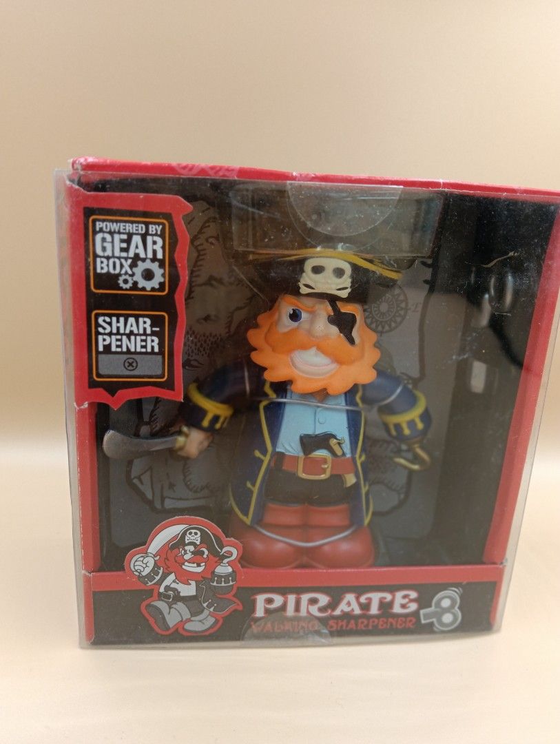 Toysmith Pirate Pencil Sharpener Interactive Toy (Category: Kids Toys) located in La Trinidad. Submitted by cherishedtreasures (Listing ID 1436986375, Image 1). Description: - Toysmith Pirate Pencil Sharpener - Fun pirate design - Gear box powered - Sharpens pencils - Detachable pirate hat - Includes instructions - Rare item.