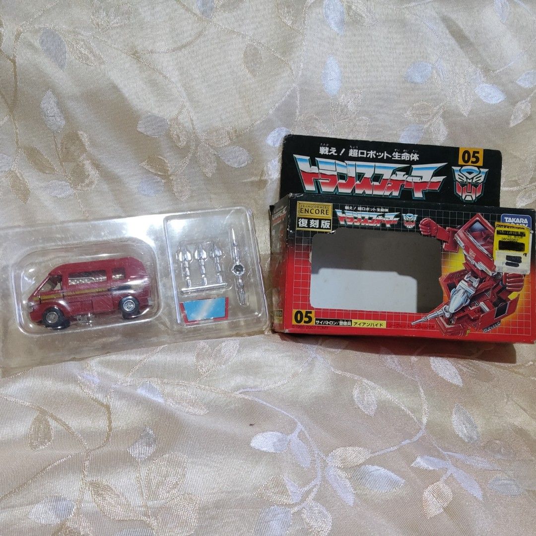 Transformers Encore 05 Ironhide (Category: Vehicle & Diecast Models) located in Manila. Submitted by cvil1027 (Listing ID 1436867283, Image 1). Description: - Encore 05 Ironhide Transformer toy - Includes Ironhide vehicle and accessories - Comes with original box - Box features Japanese text - Takara brand.