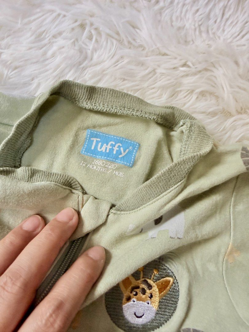 Tuffy Baby Onesie 12 Months (Category: Babies & Kids Fashion) located in Bulacan. Submitted by ta.klowset (Listing ID 1436869005, Image 3). Description: - Tuffy baby onesie with fun safari animal print. - Full-length zipper for easy dressing. - Footed bottoms with grip for - Made from soft and comfortable fabric..