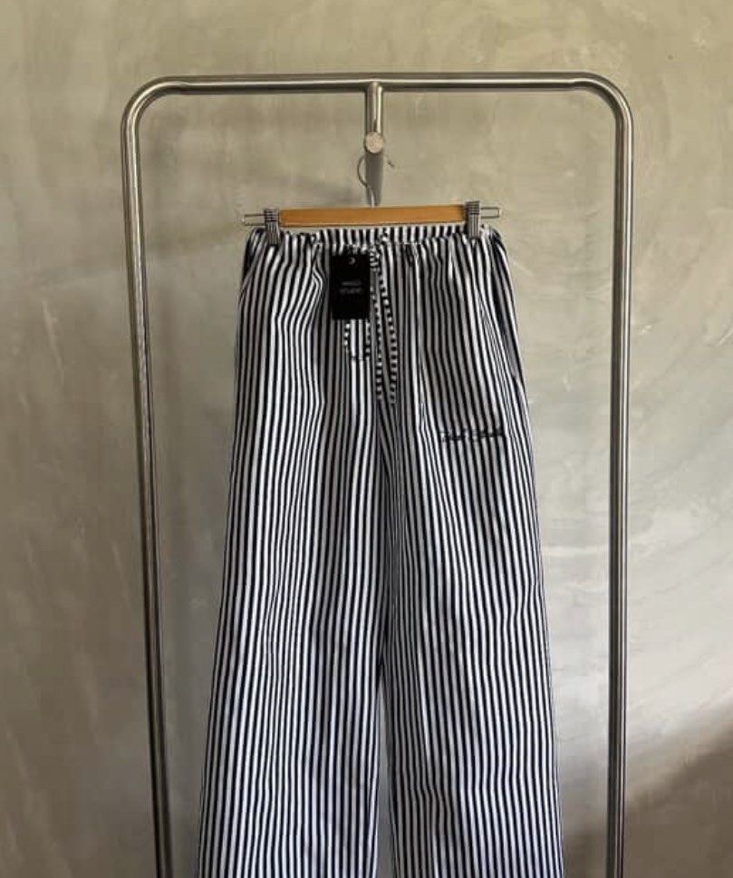 Undo Studio Pinstriped Blue & White Loungewear Pants | Size M (Category: Other Bottoms) located in Manila. Submitted by everythingbrandedpreloved_ (Listing ID 1436846285, Image 2). Description: Brand: Undo Studio (Filipino Brand) Condition: Brandnew without tags, never worn • Resembles effortless style of Isa The Label, Phia The Label, and Brandy Melville • Blue and white pinstripe design • Size M on tag (adjustable, would fit to bigger or even s