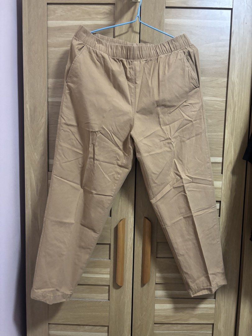 Uniqlo Relaxed Pants - Size L (Category: Other Bottoms) located in Cebu City. Submitted by teveschels38656 (Listing ID 1436962409, Image 1). Description: - Uniqlo Relaxed Pants - Color: Tan - Size: L (Waist: 68-75cm, Hips: 94-100cm) - Features: Elastic waistband, side pockets - Material: 100% Cotton - Perfect for everyday wear.