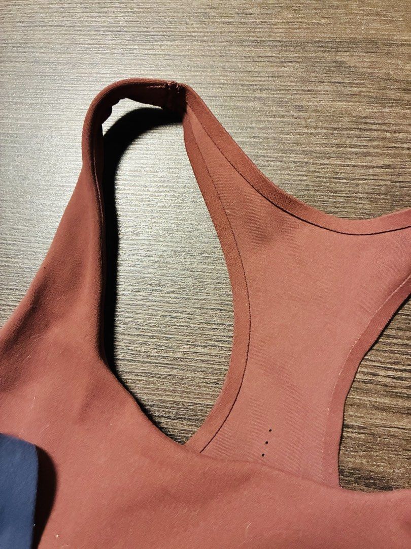 Uniqlo Sports Bra - Size S BUNDLE (Category: Activewear) located in Mandaluyong City. Submitted by mclldmrl (Listing ID 1437004763, Image 3). Description: - Uniqlo Sports Bras (Size S) - Colors: Navy Blue and Reddish-Brown - Reddish-Brown Bra: Fits 77-83cm bust - Design: Racerback - Material: Body - 88% Polyester, 12% Spandex; Lining - 92% Polyester, 8% Spandex.