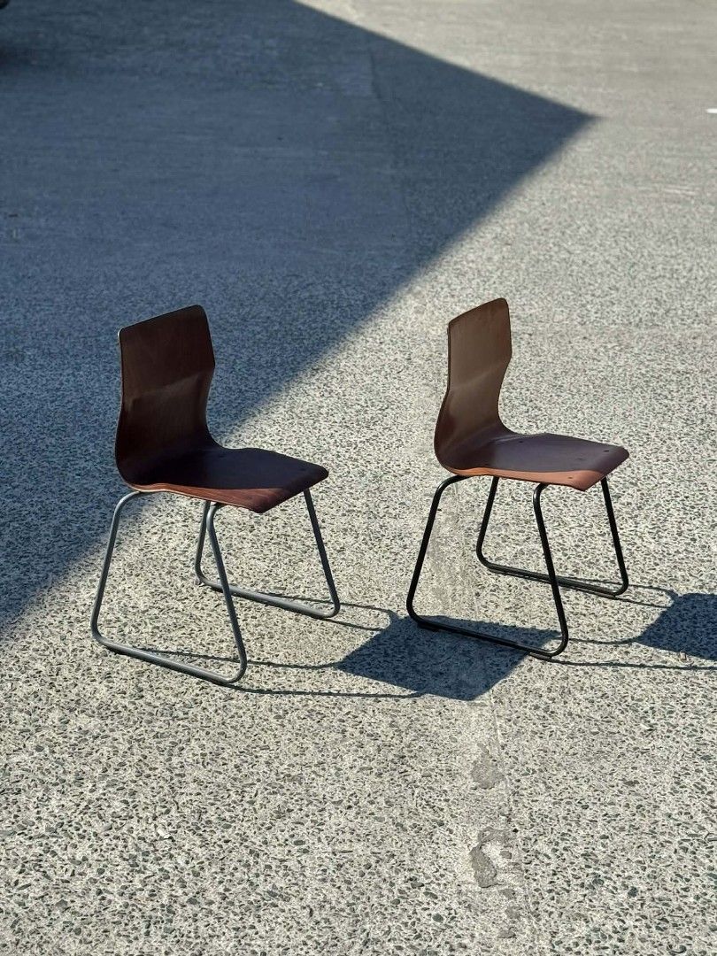 Vintage Abo West Germany Chairs (Category: Chairs) located in Valenzuela. Submitted by upcycle_things (Listing ID 1436969654, Image 1). Description: - Set of 2 vintage chairs - Wooden seat and backrest - Dark brown finish - Black metal frame - Unique curved design - Marked "Abo West Germany" - Perfect for vintage decor.
