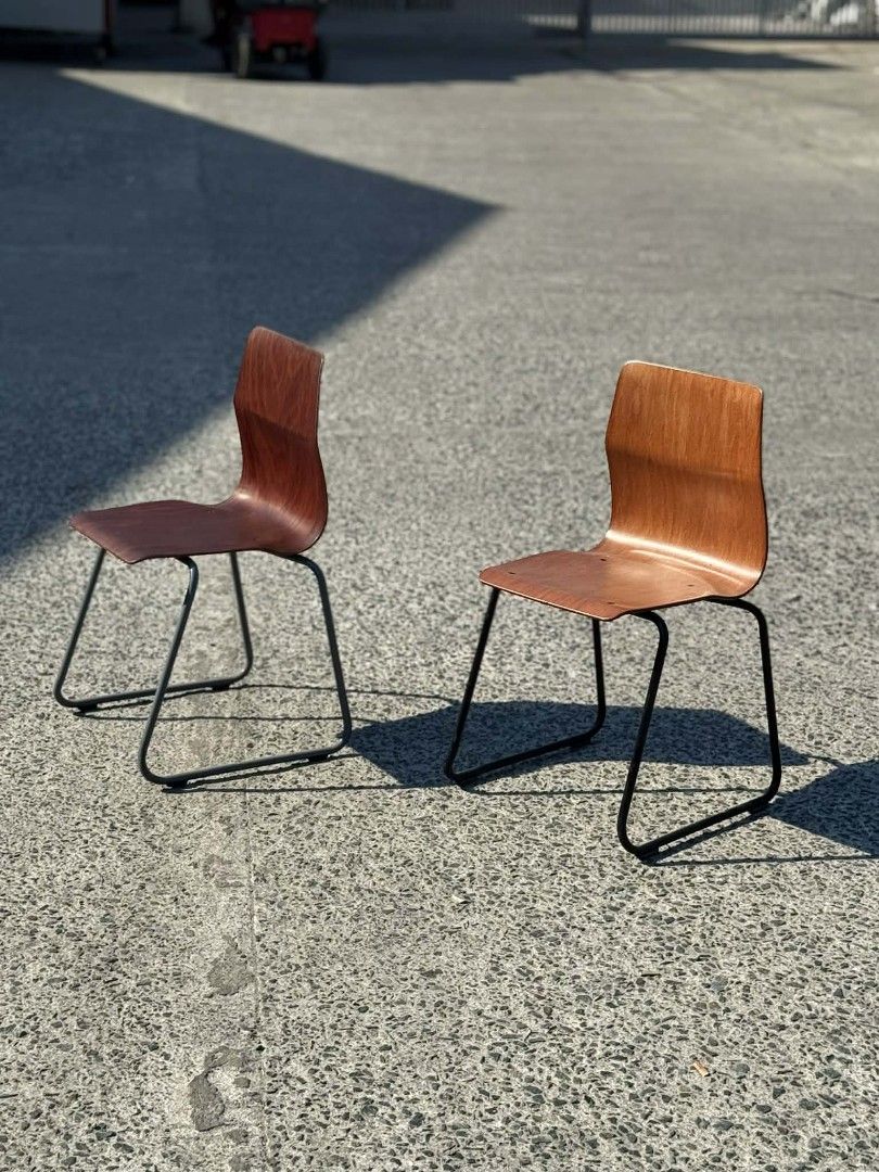 Vintage Abo West Germany Chairs (Category: Chairs) located in Valenzuela. Submitted by upcycle_things (Listing ID 1436969654, Image 2). Description: - Set of 2 vintage chairs - Wooden seat and backrest - Dark brown finish - Black metal frame - Unique curved design - Marked "Abo West Germany" - Perfect for vintage decor.