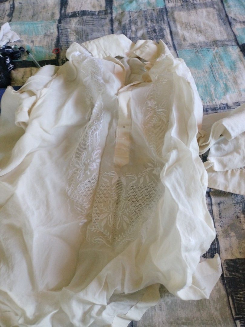 Vintage Embroidered Barong Tagalog (Category: Formal Shirts) located in Cavite. Submitted by indigence (Listing ID 1436877931, Image 1). Description: - Off-white Barong Tagalog - Intricate embroidery details - Collared neckline - Button closure - Lightweight and slightly sheer fabric - Traditional design - Embroidery on front and sleeves.