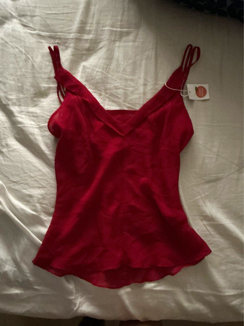 WEAR KAHEL Red Double Tank Top (Category: Sleeveless) located in Pasay City. Submitted by robinesbin (Listing ID 1436897335, Image 1). Description: - New red double cami top - Features delicate straps - Flowing design - Lightweight fabric - Unique cut and design.