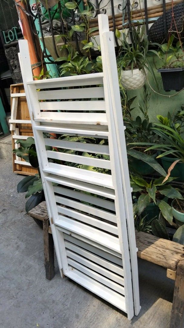 White Wooden Plant Stand (Category: Plants & Seeds) located in Valenzuela. Submitted by chris_cruz (Listing ID 1436855338, Image 2). Description: -LOCATION: North Caloocan (Deparo) - White wooden plant stand - 4-tier design - Ladder-style construction - Foldable for easy storage - Slatted shelves - Painted white - Price negotiable.