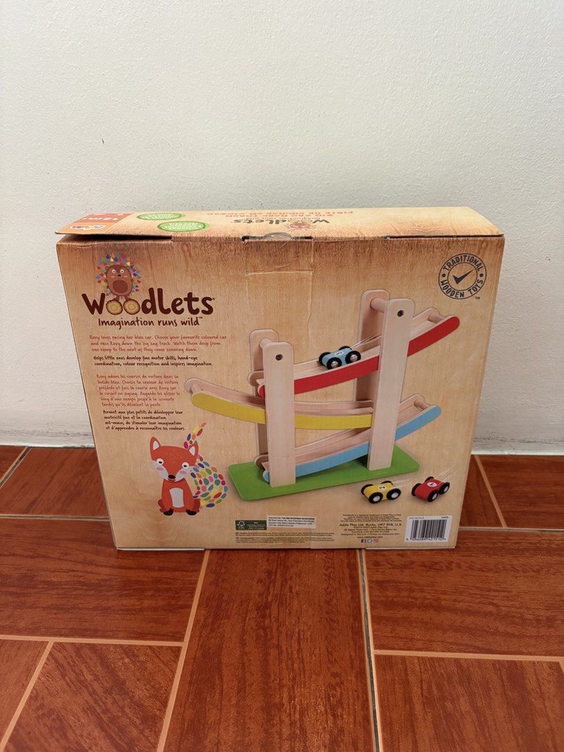 Woodlets Zig Zag Race Track (Category: Educational & Learning Toys) located in Quezon City. Submitted by mmaryf (Listing ID 1436846212, Image 3). Description: - Woodlets Zig Zag Race Track - Includes 3 colorful wooden race cars - Suitable for ages 12 months+ - Features a zig-zag design - Made of wood - Promotes imagination and fine motor skills - Fun and engaging toy.