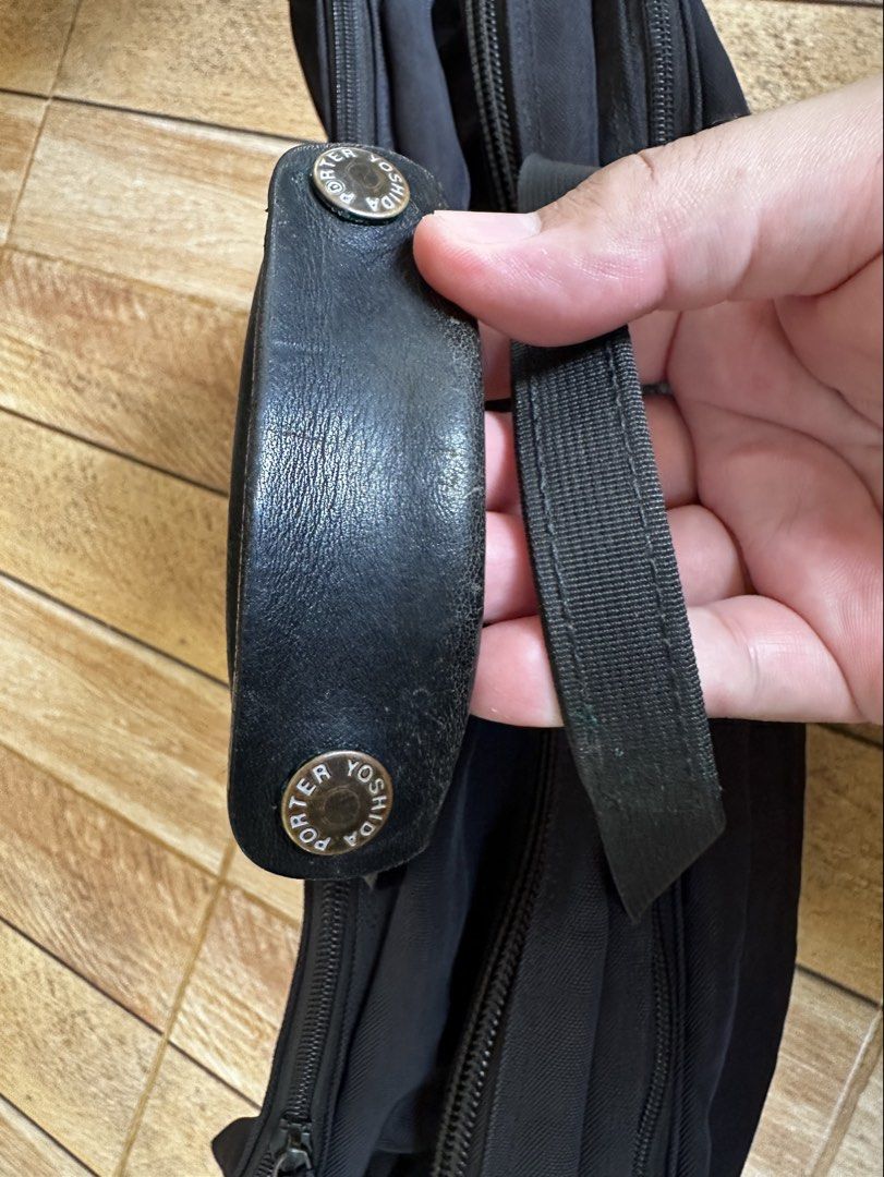 Yoshida Porter Large Bag (Category: Briefcases) located in Alaminos. Submitted by 2xtreasured (Listing ID 1376904800, Image 2). Description: Porter large bag - size approx: 18"W x 13"H x 5.5"D - has minimal flaws - please see pictures), but overall in good condition - shipping fee not included sa price - still negotiable .