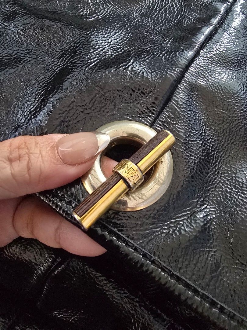 Yves Saint Laurent Black Shoulder Bag (Category: Luxury Bags & Wallets) located in Valenzuela. Submitted by lzl2428 (Listing ID 1436837116, Image 3). Description: - Yves Saint Laurent shoulder bag - Classic black color - Gold-tone hardware - Convenient front pocket - Secure zipper closure with branded pull - Comfortable shoulder strap - Durable fabric lining - Authentic YSL logo inside.