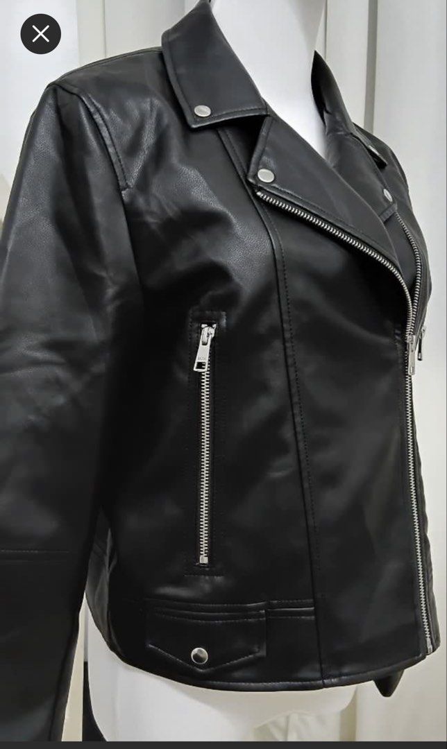 Zara Black Faux Leather Jacket (Category: Coats, Jackets and Outerwear) located in Pateros City. Submitted by kplontok08574 (Listing ID 1436829380, Image 3). Description: - Zara black faux leather jacket - Classic biker design - Notched collar - Asymmetrical zip closure - Multiple zip pockets - Size: 13-14 (CM 164) Small Women’s - Made in China.