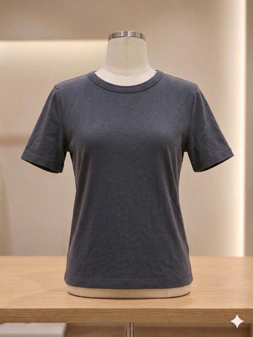 Zara Dark Gray T-shirt (Category: Shirts) located in Bacolod City. Submitted by maraline (Listing ID 1436940895, Image 1). Description: - Zara dark gray t-shirt - Size: S. fits semi-Medium - Features: Round neck, short sleeves - Made in Bangladesh - Solid color, simple design - Soft, comfortable and stretchy fabric - Perfect for casual wear Great for layering or wearing as a clean, minimalist staple piece 047.