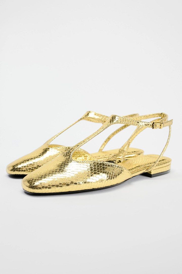 Zara Gold Metallic T-Strap Sandals (Category: Flats & Sandals) located in Butuan. Submitted by ninxaeh30 (Listing ID 1436863801, Image 1). Description: - Zara gold metallic sandals - T-strap design - Ankle strap for secure fit - Square toe - Low heel - Metallic finish - Great for special occasions or everyday glamour Size US6 or 36.
