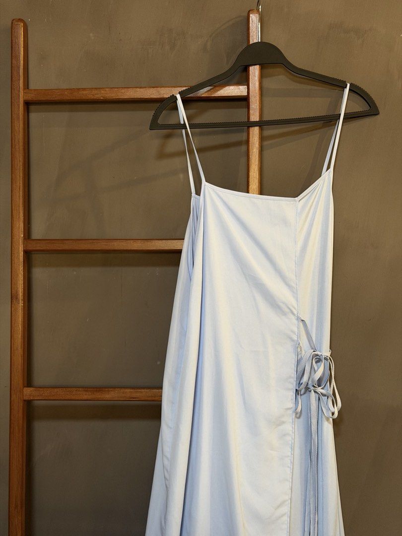 Zara Light Blue Spaghetti Strap Dress (Category: Dresses) located in Manila. Submitted by janeversus_ (Listing ID 1436915529, Image 2). Description: - Light blue dress - Spaghetti straps - Wrap style design - Tie closure - Floor-length - Perfect for special occasions - Simple and chic.
