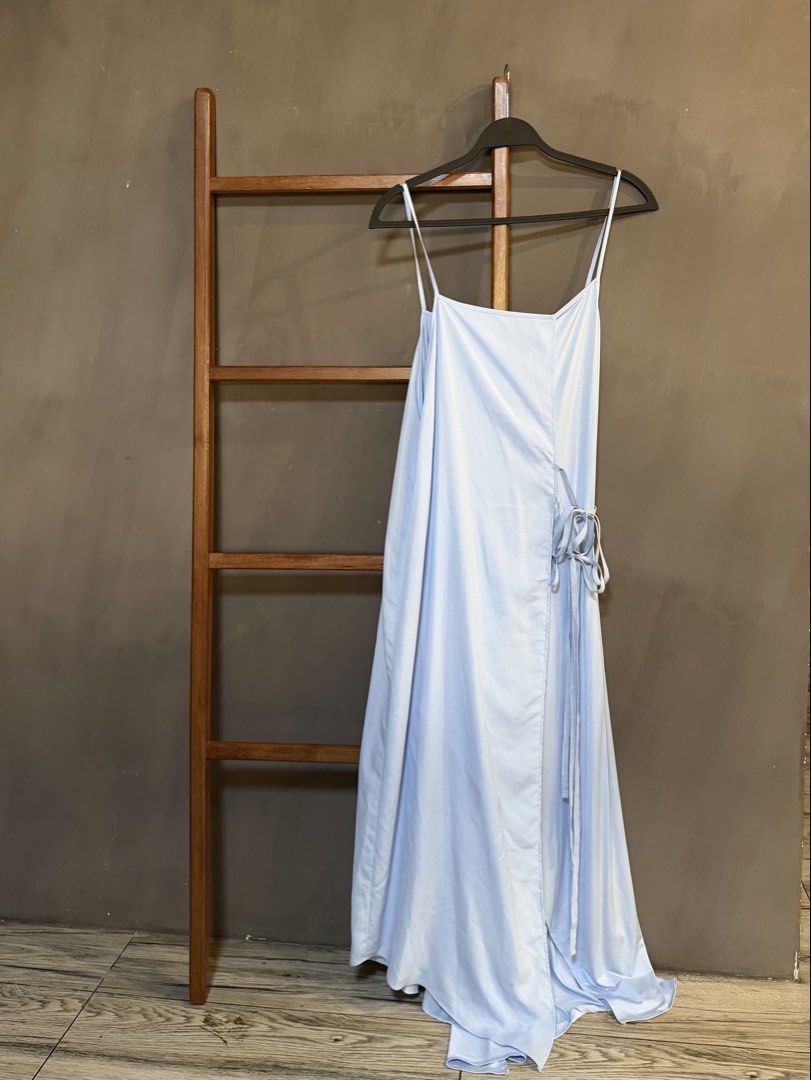 Zara Light Blue Spaghetti Strap Dress (Category: Dresses) located in Manila. Submitted by janeversus_ (Listing ID 1436915529, Image 1). Description: - Light blue dress - Spaghetti straps - Wrap style design - Tie closure - Floor-length - Perfect for special occasions - Simple and chic.