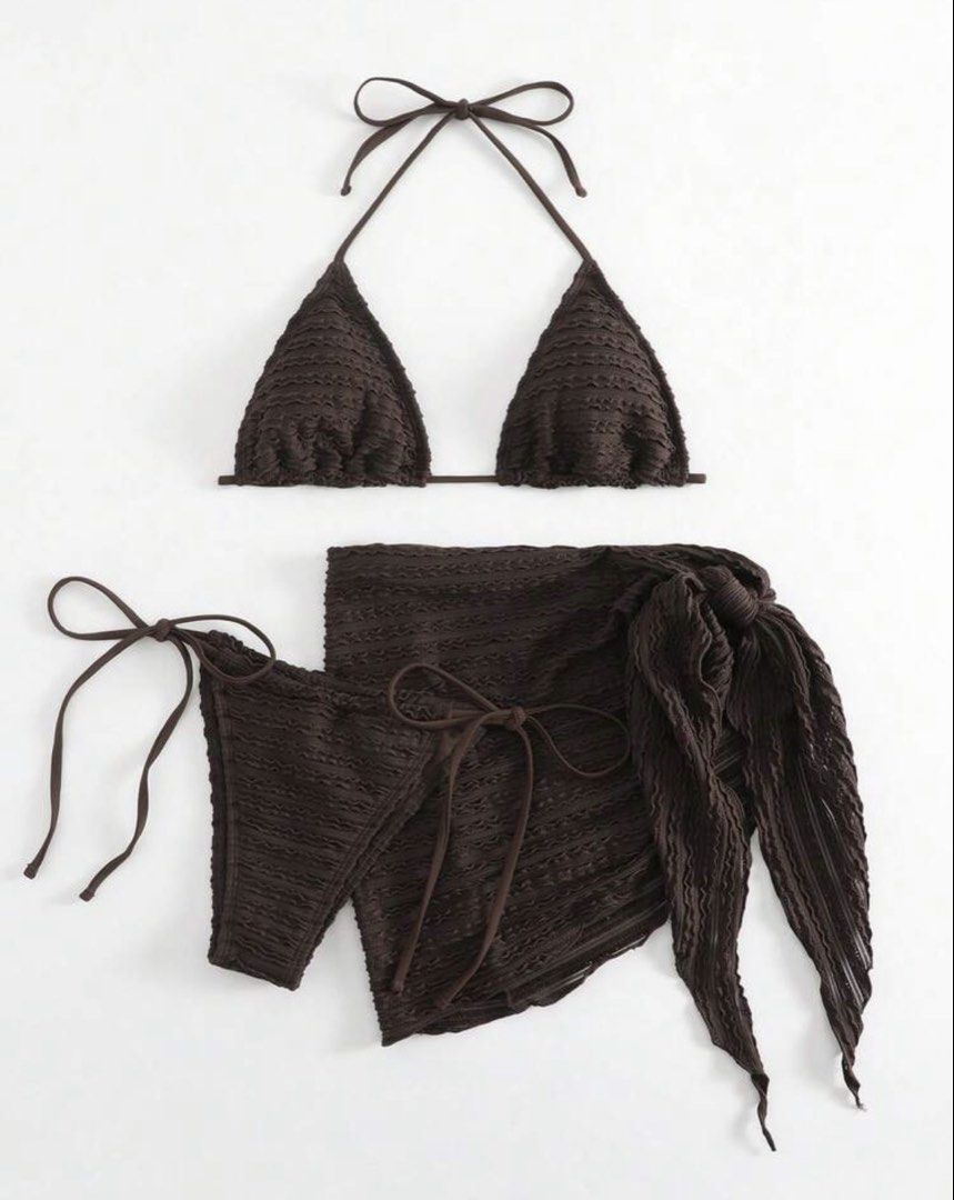 3-Piece Bikini Set with Skirt Coverup (Category: Bikinis & Swimsuits) located in Iloilo. Submitted by ja2234 (Listing ID 1441314196, Image 1). Description: - Brown crochet bikini set - Includes triangle top and tie-side bottoms - Adjustable fit with ties - Matching sarong included - Textured, cute look - Ideal for beach or pool days.