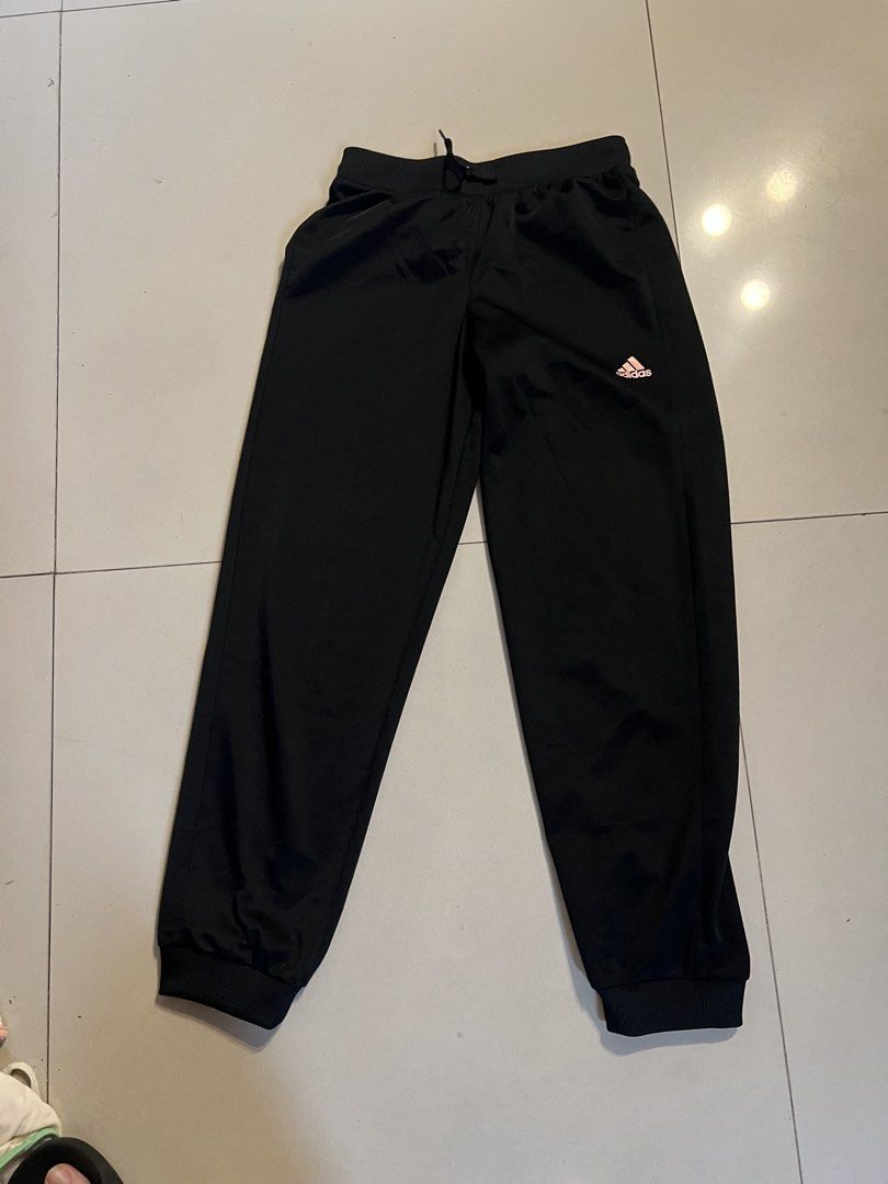 Adidas Black Track Pants Joggers (Category: Other Bottoms) located in Makati City. Submitted by abbynak (Listing ID 1441255037, Image 1). Description: Adidas black track pants. Elastic waistband, drawstring, cuffed ankles. Adidas logo. Comfortable. Good for sports/casual wear..