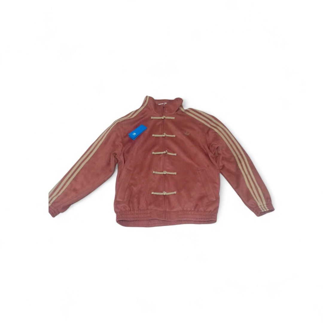 Adidas Track Jacket Red Chinese Frog Button (Category: Coats, Jackets and Outerwear) located in Manila. Submitted by woonyoo (Listing ID 1441230842, Image 1). Description: - Eye-catching red Adidas track jacket - Features iconic three stripes on sleeves - Unique Chinese frog button closures for a distinctive look - Estimated size: Medium - Ideal for casual wear or making a fashion statement.