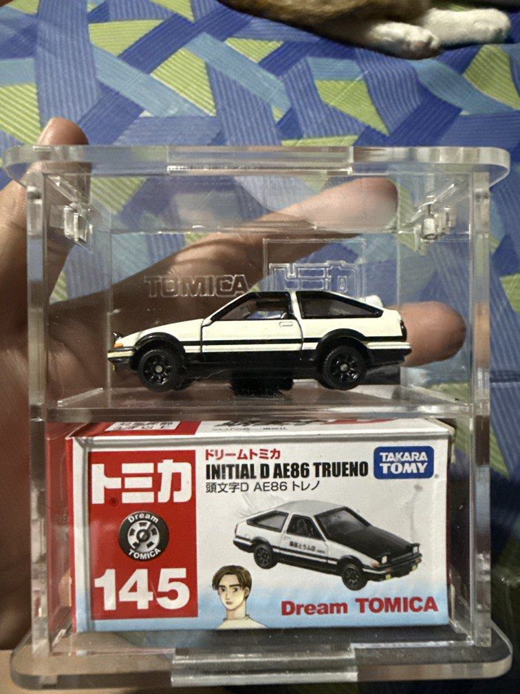 AE86 Tomica (Category: Toys & Games) located in Manila. Submitted by rheyaaron808737 (Listing ID 1441170445, Image 1). Description: Acrylic Case Included.