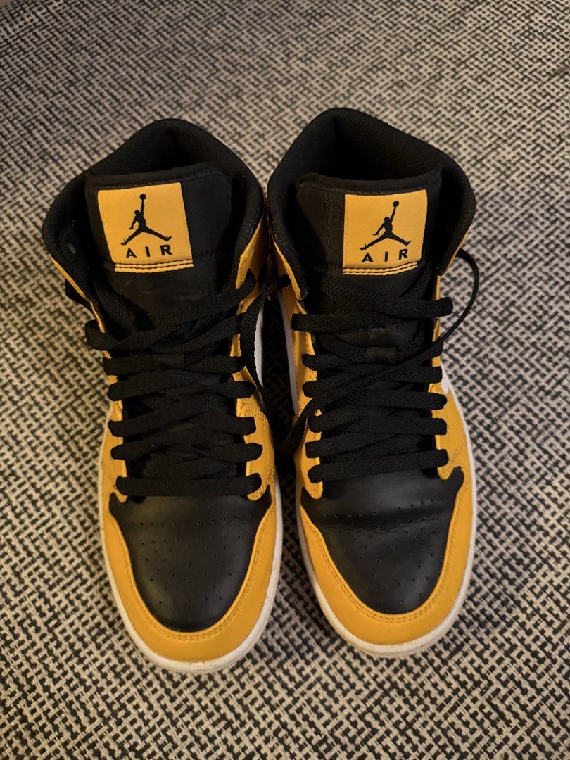 Air Jordan 1 Mid “Taxi” (Category: Sneakers) located in Manila. Submitted by deklutterph (Listing ID 1441225513, Image 2). Description: - Yellow, black, and white colorway - Classic Air Jordan 1 Mid high-top silhouette - Iconic Jumpman logo on tongue - Air Jordan Wings logo on ankle collar - Black laces and Swoosh - White midsole - Yellow outsole NO BOX. WITH SLIGHT TOE CREASE CLEAN OVERALL Bought from Jordan Store BGC Can take more pics upon req