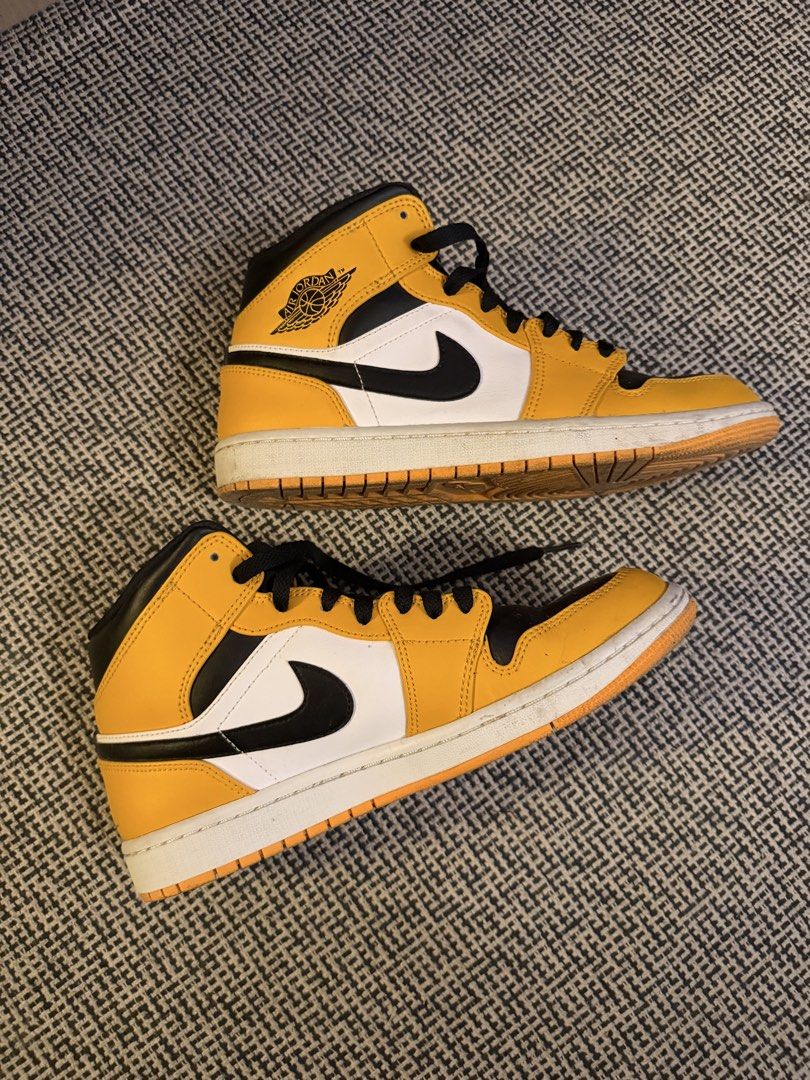 Air Jordan 1 Mid “Taxi” (Category: Sneakers) located in Manila. Submitted by deklutterph (Listing ID 1441225513, Image 3). Description: - Yellow, black, and white colorway - Classic Air Jordan 1 Mid high-top silhouette - Iconic Jumpman logo on tongue - Air Jordan Wings logo on ankle collar - Black laces and Swoosh - White midsole - Yellow outsole NO BOX. WITH SLIGHT TOE CREASE CLEAN OVERALL Bought from Jordan Store BGC Can take more pics upon req