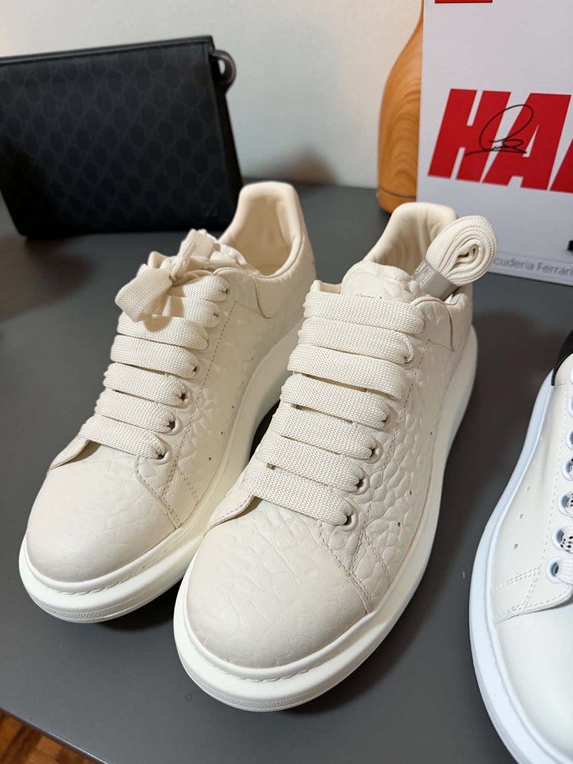 Alexander McQueen Oversized Sneakers Cream Crocodile Embossed (Category: Sneakers) located in Makati City. Submitted by decluttering822 (Listing ID 1441251002, Image 1). Description: - Cream Alexander McQueen oversized sneakers - Crocodile embossed leather - Classic chunky sole - Comes with extra laces - Ideal for everyday wear - Please check photos for condition details.