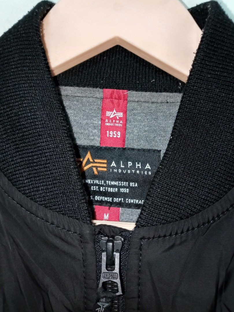 Alpha Industries MA-1 Bomber Jacket Black Size M (Category: Coats, Jackets and Outerwear) located in Manila. Submitted by onewikstraight (Listing ID 1441372756, Image 2). Description: - Classic black Alpha Industries bomber jacket - Size: Medium (M) 21W 27L - Features iconic Alpha Industries logo and detailing - Zipper closure with secure snap button pockets - Versatile for everyday wear - A wardrobe essential PM cavite location 1200+sf.