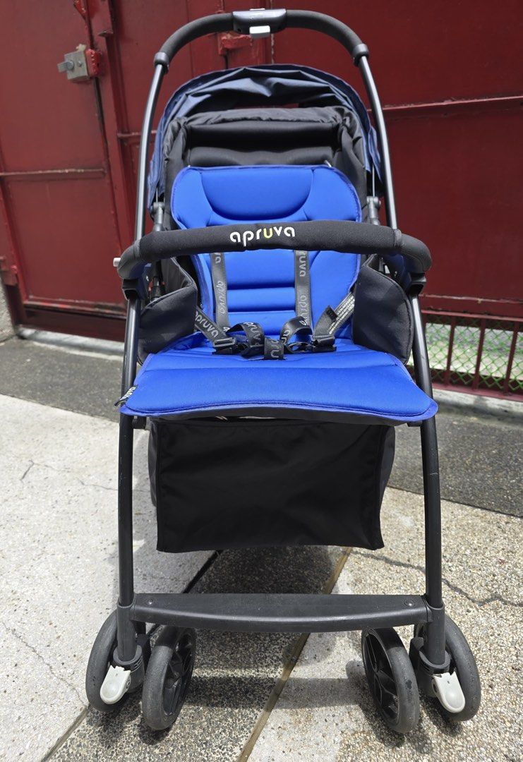 Apruva Blue Lightweight Baby Stroller (Category: Strollers) located in San Juan City. Submitted by ilovetigers (Listing ID 1441247069, Image 1). Description: Apruva stroller in blue. Lightweight, easy to fold, with storage basket. Features 5-point harness and ventilated canopy. Perfect for daily use..