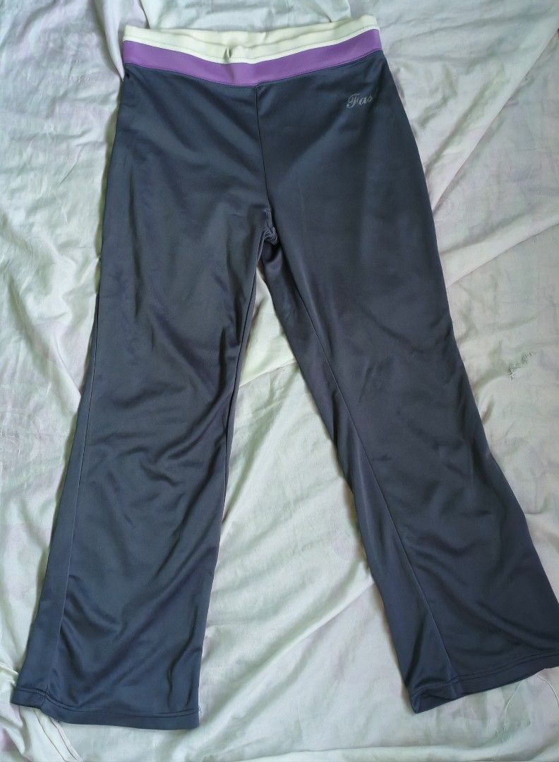 ASICS Grey Purple White Trim Athletic Pants (Category: Other Bottoms) located in Rizal. Submitted by darynneryn (Listing ID 1441205536, Image 1). Description: - ASICS grey athletic pants - Purple and white trim at waistband - Comfortable for workouts or casual wear - Standard athletic fabric material - Slightly flared leg opening.
