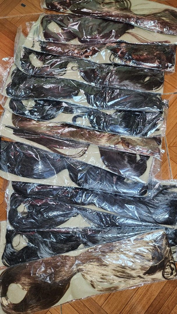 Assorted Synthetic Hair Extensions - Various Colors (Category: Hair Accessories) located in Baguio. Submitted by chiechie1234 (Listing ID 1441245263, Image 2). Description: - 31 PCS ( TAKE ALL ) - Bundle of synthetic hair extensions - Variety of colors: solid blonde, brown, and multi-colored streaks (purple, green, blue, yellow) - Different styles included - Ideal for adding volume or trying new hairstyles - All items are brand new and in origina