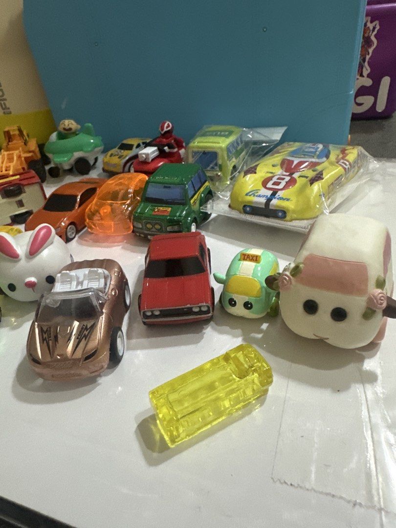 Assorted Toy Cars and Vehicles (Category: Vehicle & Diecast Models) located in Cainta. Submitted by shopbyyna (Listing ID 1441217963, Image 2). Description: - Collection of toy cars and vehicles - Includes: yellow race car (No. 8), green bus, red bus, construction vehicle, and various smaller cars - Some items are still in original packaging - Ideal for toy car collectors or children - All items are sold as pictured.