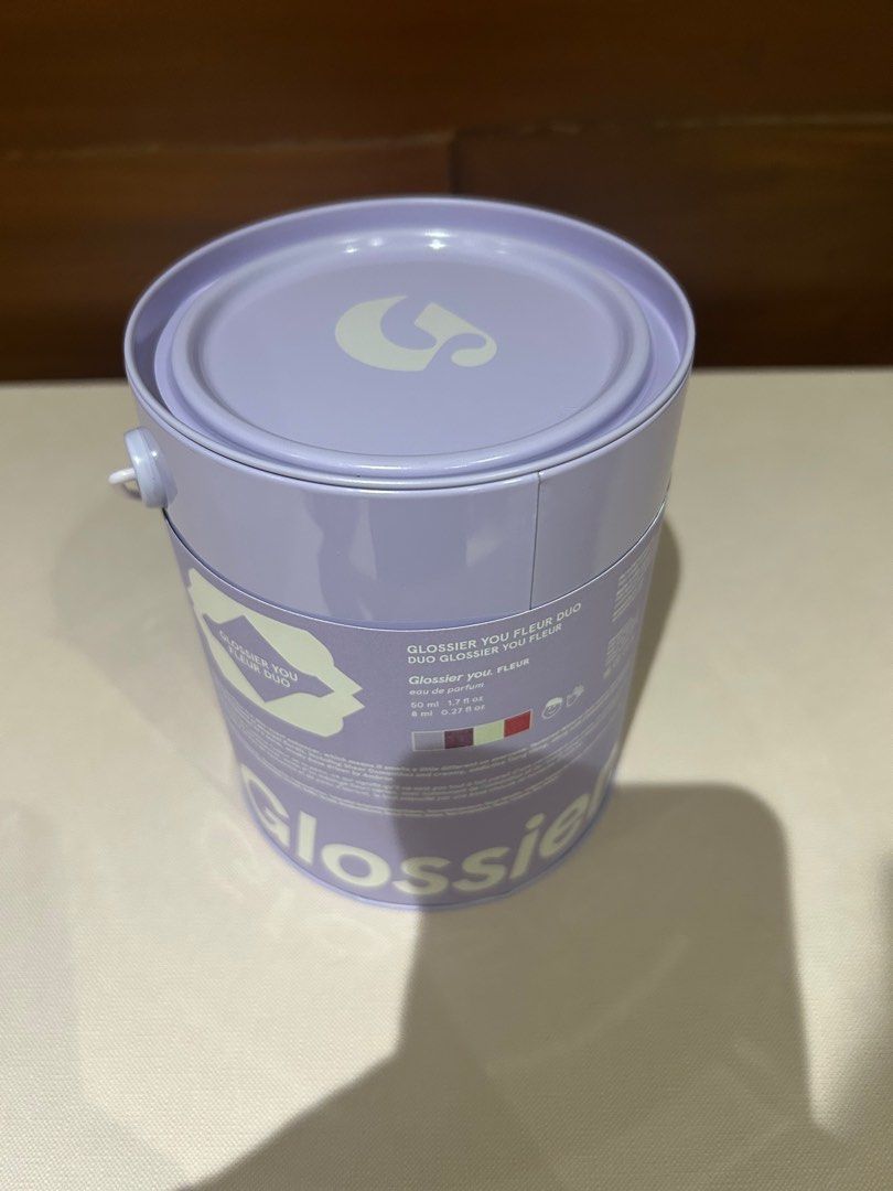 Authentic Glossier Tin Can Container only (Category: Accessory Holder, Box & Organizers) located in Manila. Submitted by chiccorner (Listing ID 1441280017, Image 1). Description: Brand new Tin Can only Glossier Brand Size Diameter 4.25” Height 5.5” Purple color.