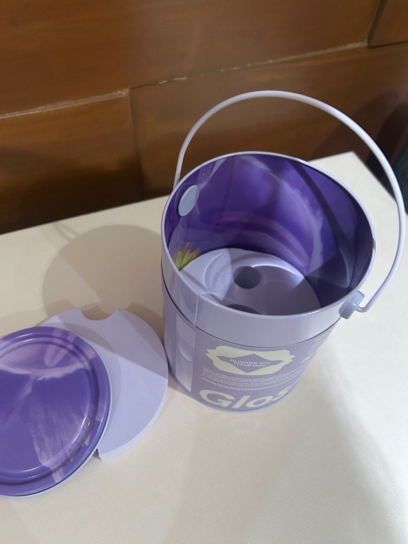 Authentic Glossier Tin Can Container only (Category: Accessory Holder, Box & Organizers) located in Manila. Submitted by chiccorner (Listing ID 1441280017, Image 3). Description: Brand new Tin Can only Glossier Brand Size Diameter 4.25” Height 5.5” Purple color.
