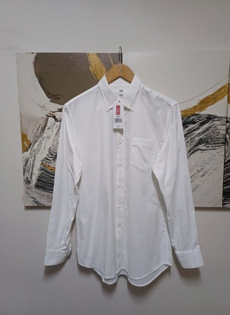 AUTHENTIC UNIQLO SLIM FIT OXFORD BUTTON DOWN, Original 700 Price Php 2,490 (Category: Formal Shirts) located in Manila. Submitted by bvnnie (Listing ID 1441237778, Image 3). Description: Actual size using inches Armpit to Armpit/20 Lenght/Front 29.5 Back 30 fittings is Medium Excellent Condition, Issue:0 Message if you have any other question about sizing. We do shipping nation wide I'm also open for video call so that you can see the item you 'r