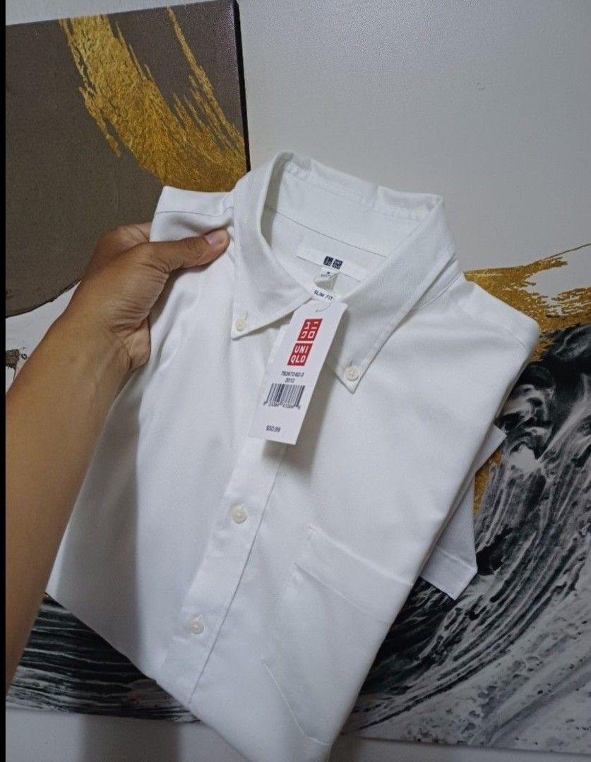 AUTHENTIC UNIQLO SLIM FIT OXFORD BUTTON DOWN, Original 700 Price Php 2,490 (Category: Formal Shirts) located in Manila. Submitted by bvnnie (Listing ID 1441237778, Image 2). Description: Actual size using inches Armpit to Armpit/20 Lenght/Front 29.5 Back 30 fittings is Medium Excellent Condition, Issue:0 Message if you have any other question about sizing. We do shipping nation wide I'm also open for video call so that you can see the item you 'r