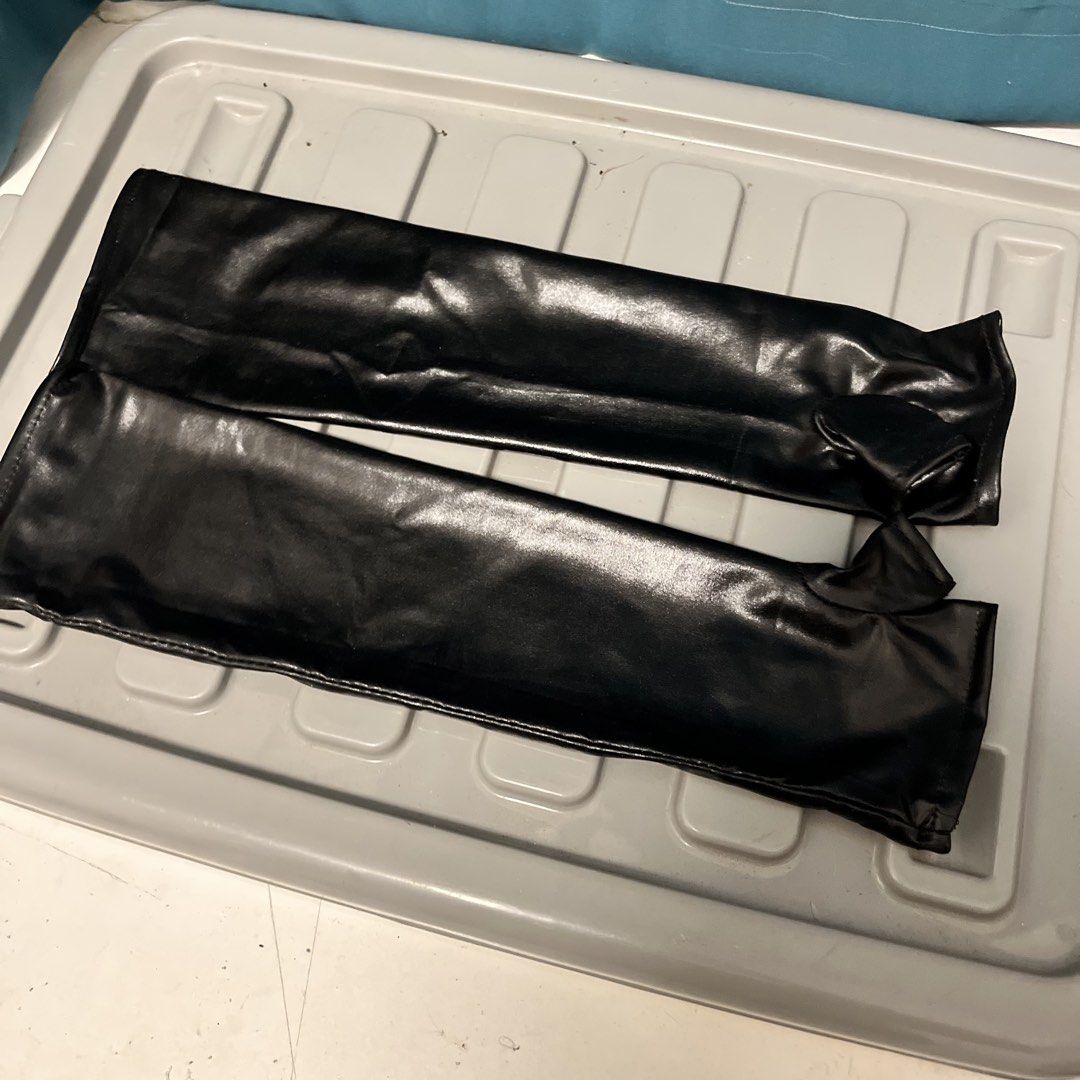 Black Faux Leather Long Gloves (Category: Gloves) located in San Pablo. Submitted by thea_328 (Listing ID 1441370254, Image 1). Description: - Black faux leather long gloves - Reach past the elbow - Material has a slight sheen - Ideal for costumes or fashion statements - Ready for a new home.
