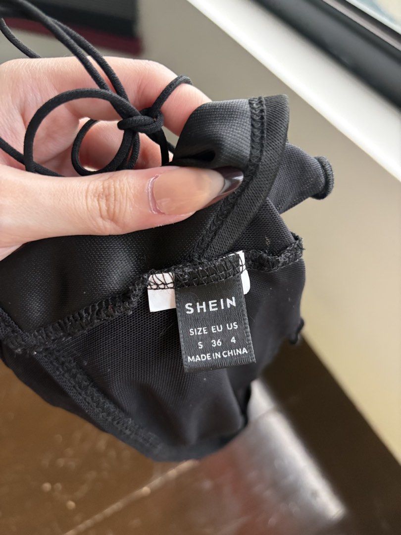 SHEIN Black Ruched Halter Neck Crop Top (Category: Sleeveless) located in Santa Rosa. Submitted by prelovedby.her_ (Listing ID 1441328906, Image 3). Description: Color: Black Size: S Condition: No visible flaws; in great condition RFS: Decluttering 🧹 📍 Shipping from: Fairview, QC 🚚 Mode of Delivery: Lalamove | J&T 💵 Payment: GCash | Bank Transfer Feel free to message for any questions! 🤍.
