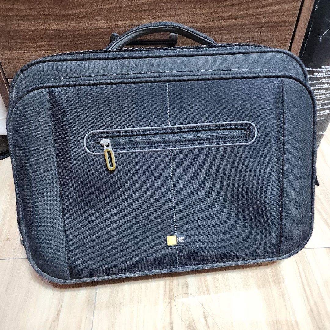 Case Logic Black Laptop Bag (Category: Laptop Bags & Sleeves) located in Cavite. Submitted by loril.ke_359 (Listing ID 1441253202, Image 1). Description: ● Case Logic Hardshell Laptop Bag ●Condition: All zippers are working, 'though it has the usual Wear&Tear at the bottom of the bag. ● Selling for: As-is NO strap & NO box (Cuz I lost it) ● RFS: Decluttering ● SF: Shouldered by Buyer ● No To Bogus Buyers ● Dimensions: - Height: 31.8 cm / 12.51 in