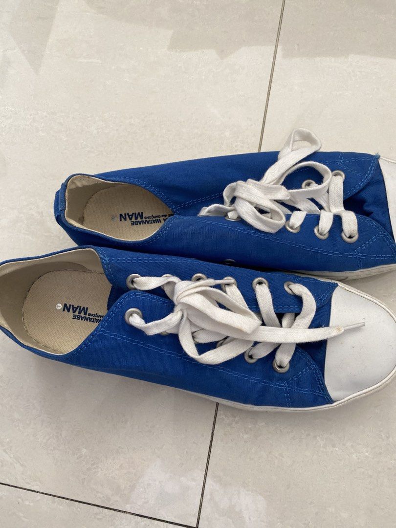 CDG JUNYA WATANABE MAN Blue Canvas Sneakers (Category: Sneakers) located in Quezon City. Submitted by viber9163490242 (Listing ID 1441221076, Image 2). Description: - Junya Watanabe MAN blue canvas sneakers - Classic low-top design - Features white toe cap and laces - Comfortable for everyday wear - Minor signs of use on soles and toe caps - Ideal for casual outfits.