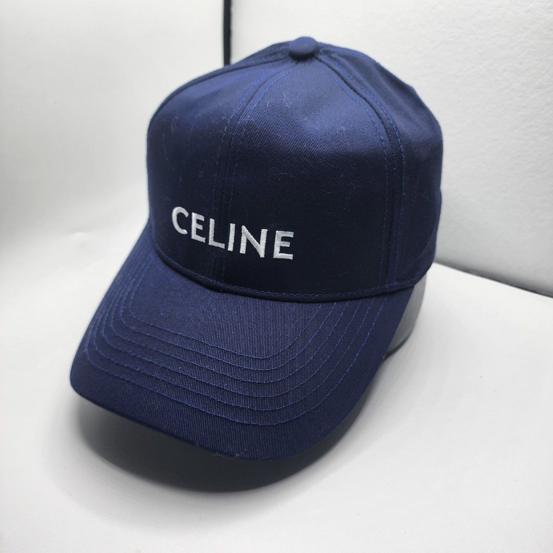 Celine Navy Blue Baseball Cap (Category: Caps & Hats) located in Quezon City. Submitted by randomthangz (Listing ID 1441308038, Image 2). Description: - Navy blue Celine cap - Features embroidered Celine logo on the front - Celine branding on the sweatband and internal taping - Classic baseball cap style with a curved brim - Ideal for everyday wear.