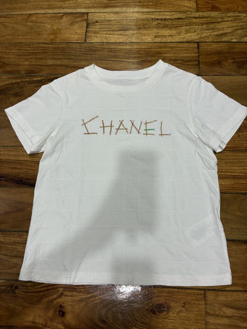 Chanel White Quilted T-Shirt (Category: Shirts) located in Quezon City. Submitted by anolymous (Listing ID 1441324111, Image 1). Description: Feel free to message me for more photos or details :).