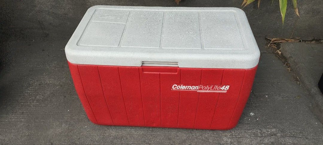 Coleman Poly Lite 45 Cooler Red/White (Category: Hiking & Camping) located in Manila. Submitted by benjie.benjie3 (Listing ID 1441300559, Image 1). Description: - Coleman Cooler - Color: Red and White - Features a convenient carrying handle - Ideal for picnics, camping trips, and parties - Excellent at keeping food and drinks chilled - Proudly Made in the USA - Shows minor scuffs and scratches from regular use Capacity: 48 Quarts Estimate size: H
