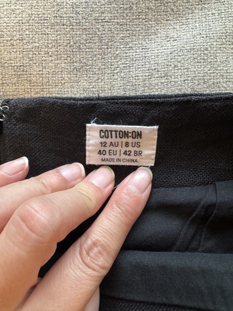 Cotton On Black Miniskirt (Category: Skirts) located in Makati City. Submitted by sabmi (Listing ID 1441259787, Image 2). Description: Miniskirt with zipper in the back Worn low-waisted Measurements (laid flat): Waist - 16” Hips (middle point) - 21” Length - 13”.