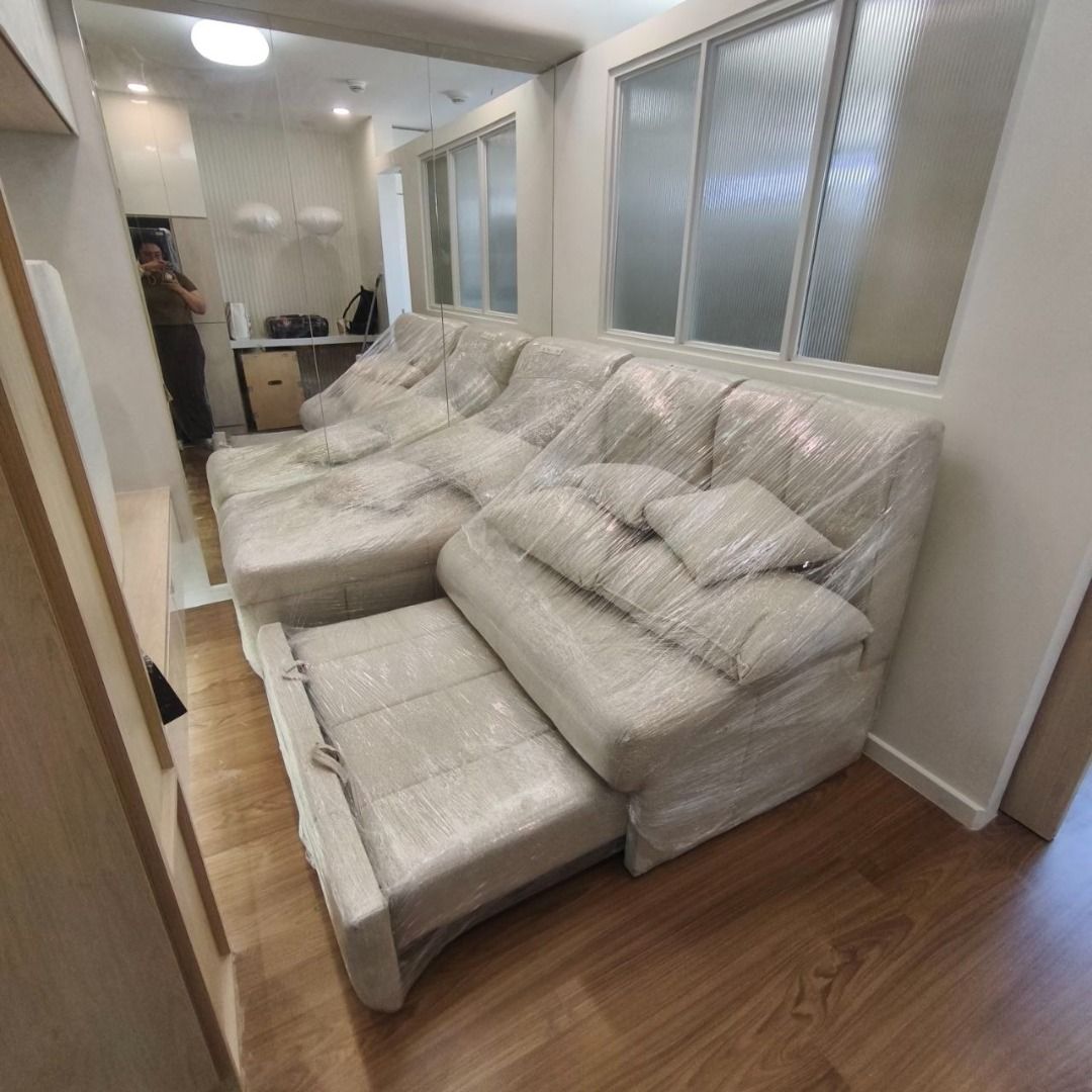 Custom made L-type sofa bed from PAN (Category: Sofas) located in Pasig City. Submitted by apdb_ (Listing ID 1441177729, Image 1). Description: - Custom made L-type sofa bed - L-shape design for space efficiency Still wrapped Bought for P 70,000 Can show receipt if needed RFS: Wrong size.